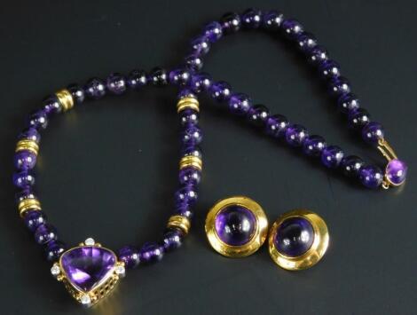 A Cathy Stephens amethyst necklace and earring set