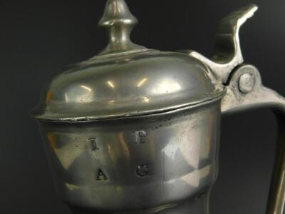 A 19thC pewter flagon - 2