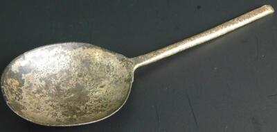 An early 17thC small pewter slip top spoon