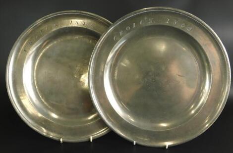 A pair of early 19thC single reeded Scottish church pewter collection plates