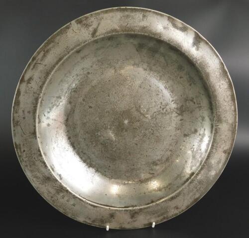 A late 17thC deep pewter dish by Richard Johnson