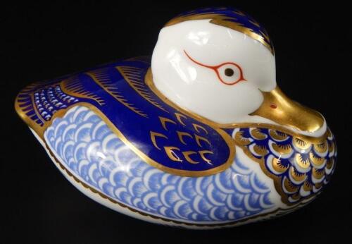 A Royal Crown Derby Imari paperweight