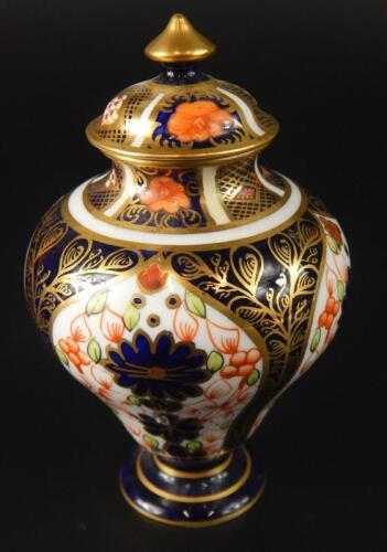 A small Royal Crown Derby baluster vase and cover