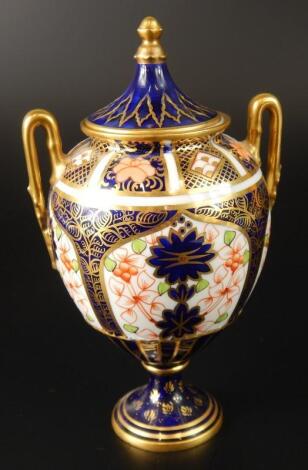 A Royal Crown Derby two handled baluster vase and cover