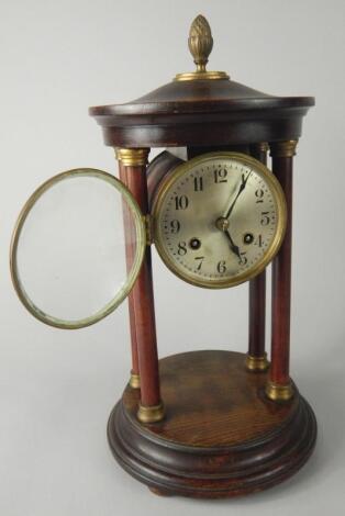 An early 20thC portico mantel clock