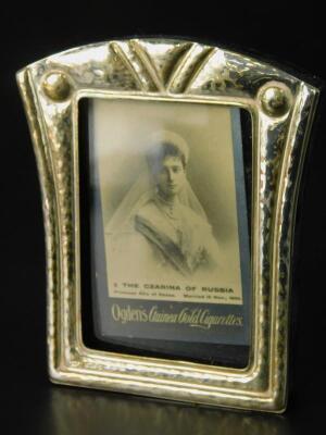A late 20thC hammered photograph frame