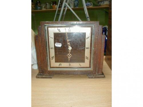 An oak mantel clock by Smiths