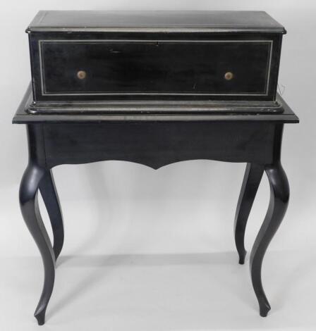 A late 19thC Swiss ebonised musical box and stand by J.E. Cuendet