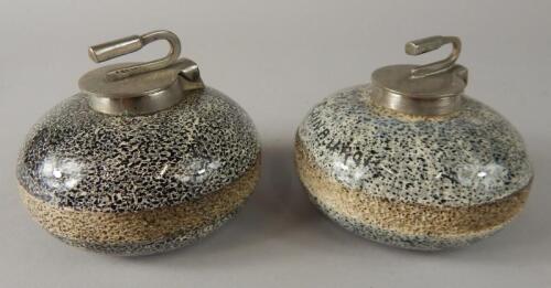 Two table top granite style curling stone inkwells