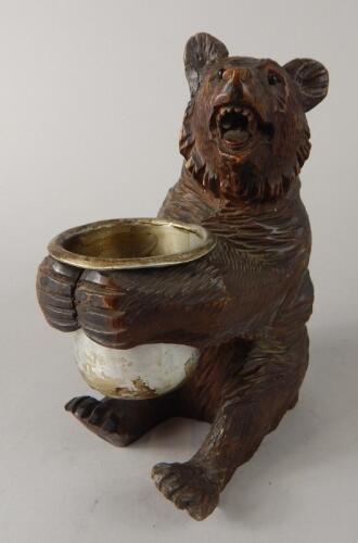 A 20thC Black Forest bear open salt