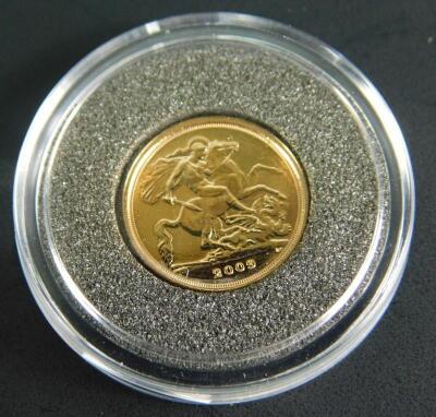 An Elizabeth II gold quarter sovereign