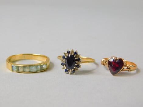 Three yellow metal rings