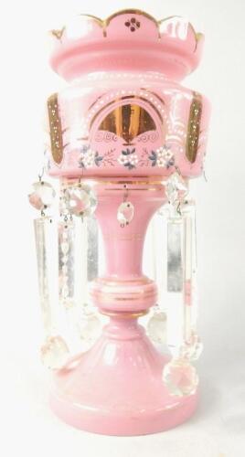 A Victorian pink overlay glass table lustre