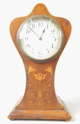 An Edwardian mahogany balloon shaped marquetry mantel clock