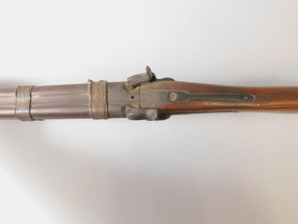 A muzzle loading double barrel shotgun