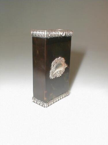 A Victorian tortoiseshell and silver matchbox cover