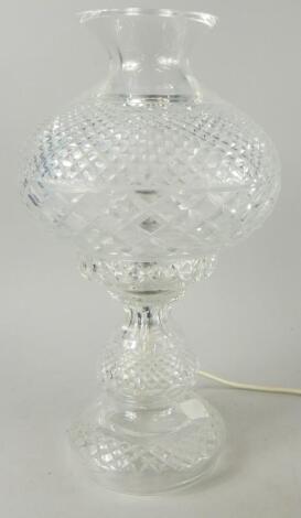 A cut glass lead crystal table lamp and shade