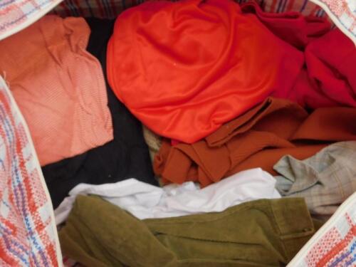 A large quantity of 1990's designer clothes.