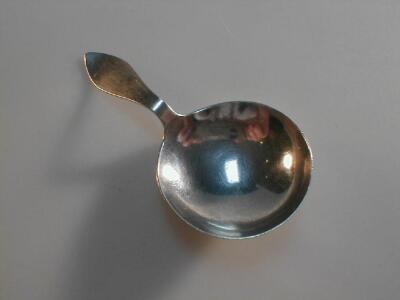 A George V silver caddy spoon