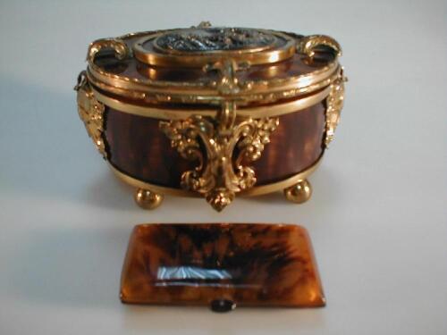 A cast brass and faux tortoiseshell casket