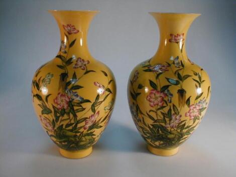 A pair of Chinese baluster vases with everted rims