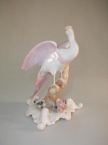 A Royal Crown Derby bone china figure of a ho-ho bird