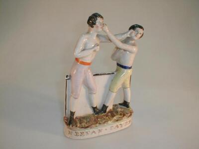 A Staffordshire pottery boxing figure group of Heenam & Sayers