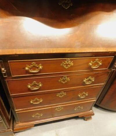 A mahogany bureau in George III style