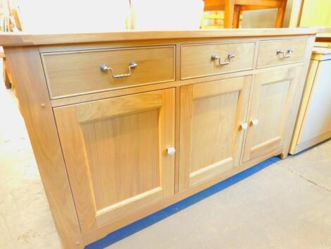 A Wills & Gambier light oak sideboard