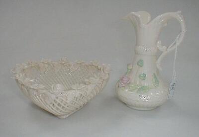 A Belleek heart shape basket and a jug