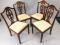 A set of four mahogany dining chairs