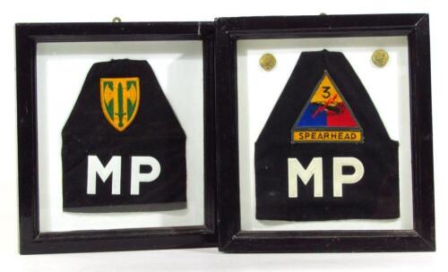 A mid-20thC Military Police spearhead badge and two brass buttons