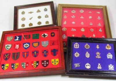 Various military iron on metal badges etc