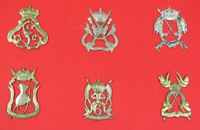 Various metal artillery cap badges - 2