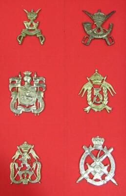 Various metal artillery cap badges - 14