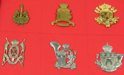 Various metal artillery cap badges - 17