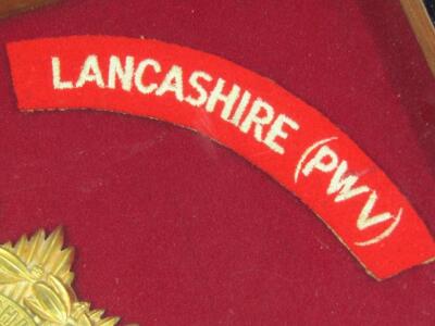 A South Lancashire Regiment group of iron on badges - 7