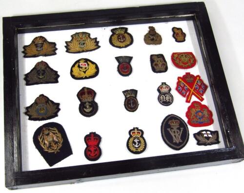 Various embroidered navy and other badges