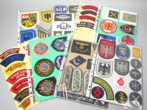 Various early 20thC and other military army related and other cloth badges