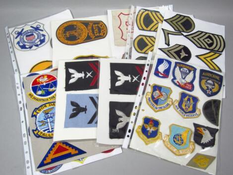 Various embroidered and other badges