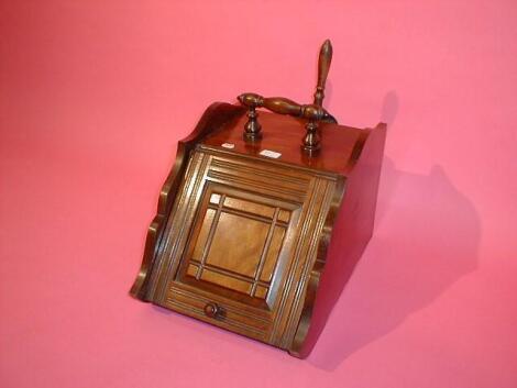 A late Victorian walnut coal scuttle