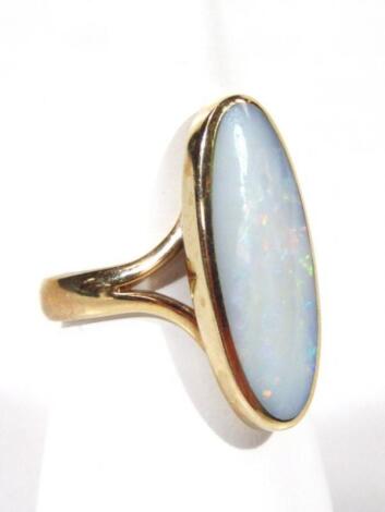 An opal style dress ring