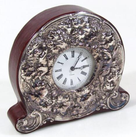 An Elizabeth II silver and leather finish mantel clock