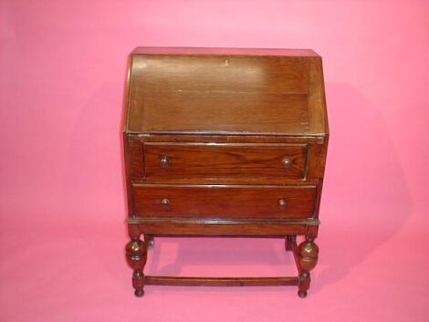 A 1930's oak bureau.