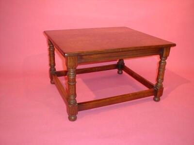 A reproduction oak coffee table