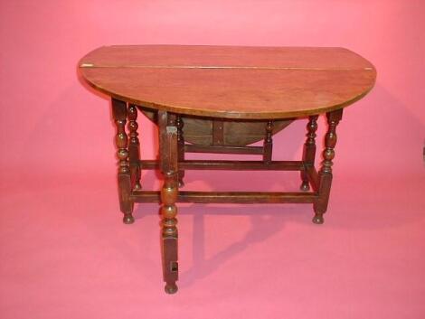 A 17thC and later oak gateleg dining table