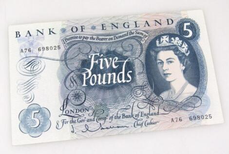 A blue £5 note number A76698025