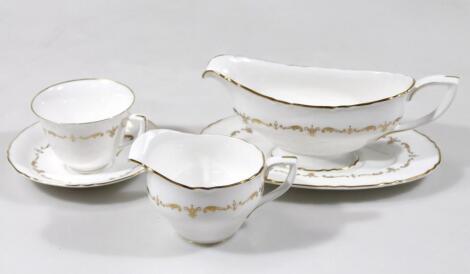 A Royal Worcester Gold Chantilly part dinner service