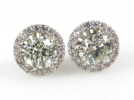 A pair of 18ct white gold diamond earrings