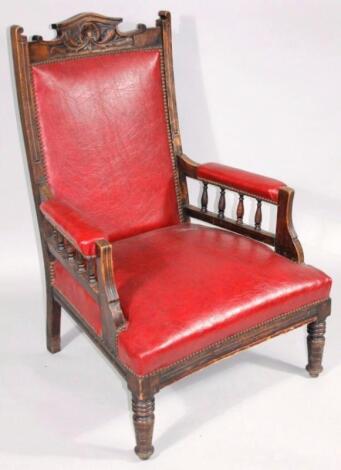 A Victorian walnut stained armchair